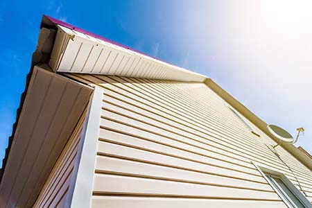 house with cream color lap siding